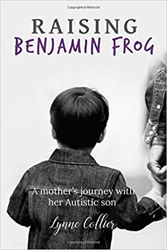 Young boy holding an adult's hand